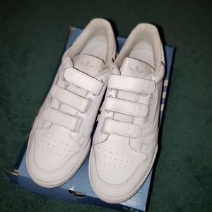 Adidas continental strap white with red and green detail